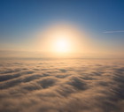 Astral Awakening: Witnessing Dawn's Magic Above the Cloudscape