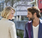 Man and woman smiling at each other