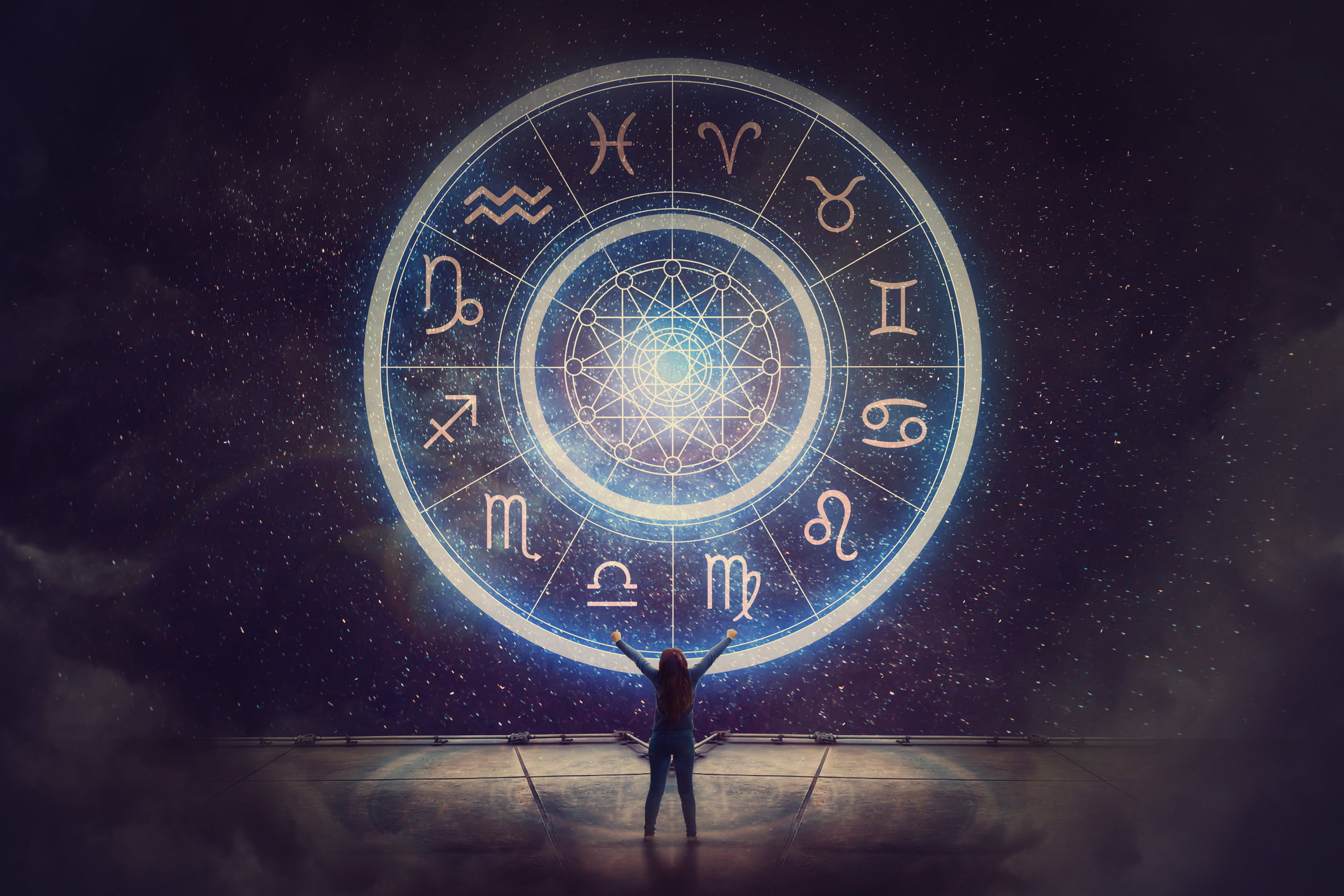 Woman raising hands looking at the night sky. Astrological wheel projection, choose a zodiac sign. Trust horoscope future predictions, consulting stars. Power of universe, astrology esoteric concept.