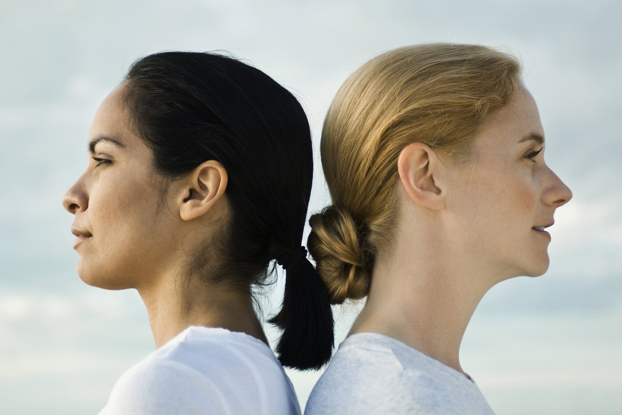 Women back to back, portrait