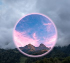 Modern aesthetic art collage with mountains, clouds of pink sky and landscape in foggy weather. Portal in good weather, travel in time and space concept.