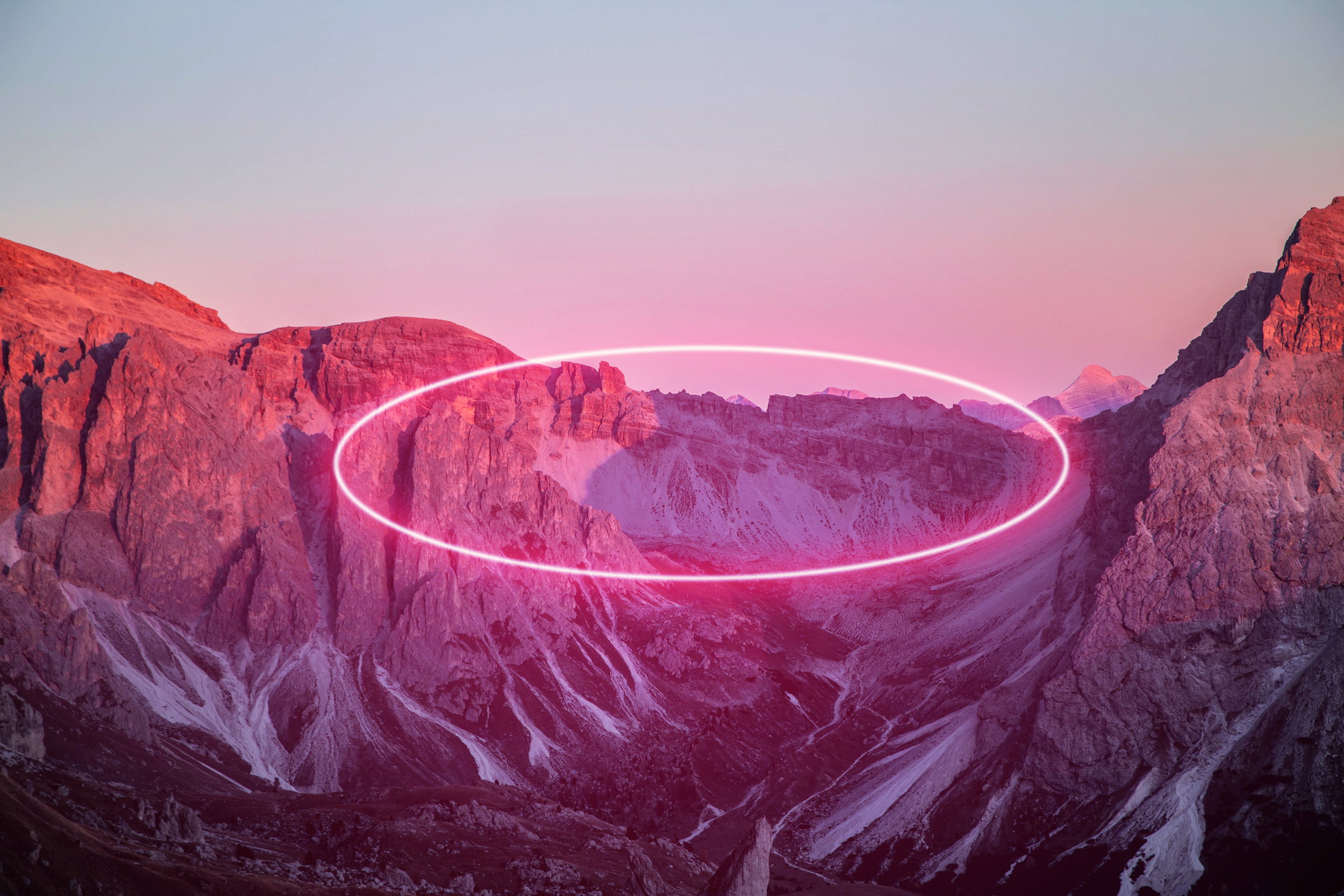 Stunning circle made with neon light performing in the Alps mountains.