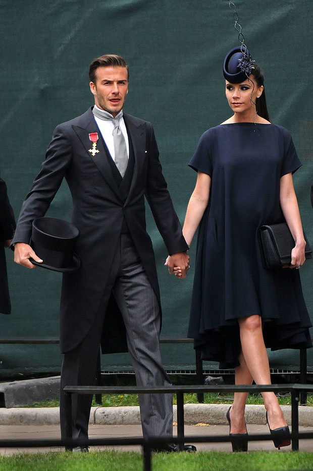 David i Victoria Beckham przybywają na królewski ślub księcia Williama i Catherine Middleton w Opactwie Westminsterskim 29 kwietnia 2011 r. w Londynie.