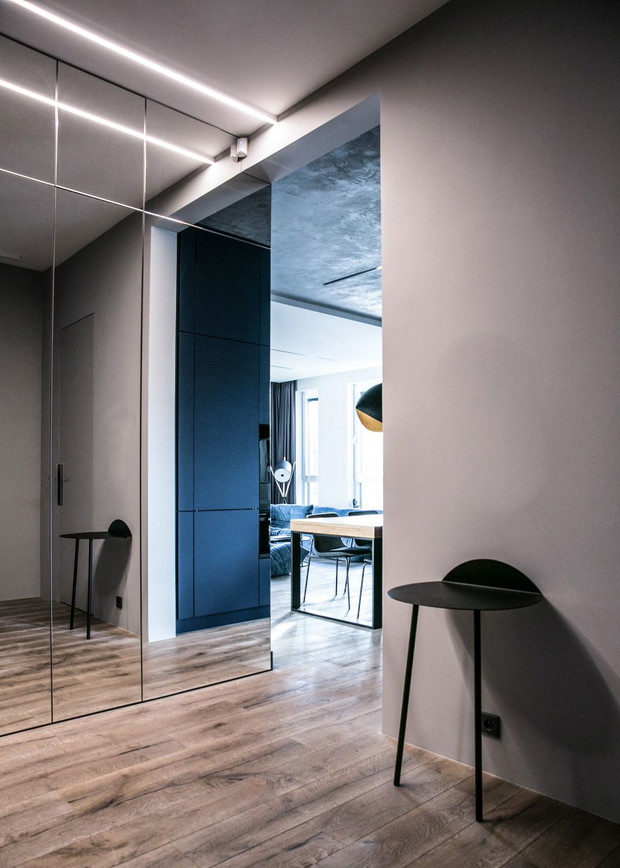 Apartament z granatowymi akcentami w Poznaniu, projekt: Joanna Zabłocka