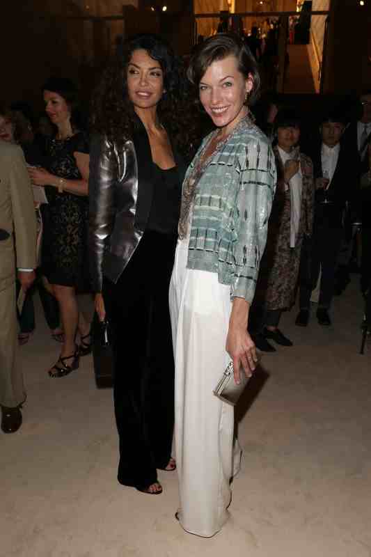 Gwiazdy na Paris Fashion Week haute couture jesień-zima 2013: Afef Jnifen i Milla Jovovich na pokazie Giorgio Armani, fot. East News  