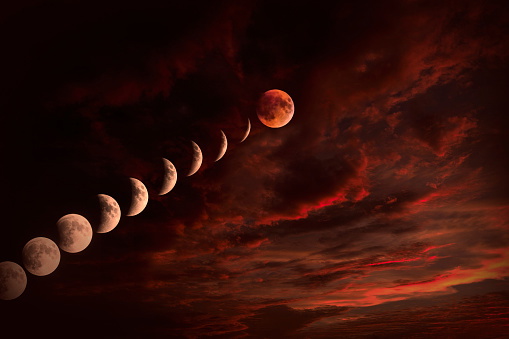 Moon on cloudy night sky