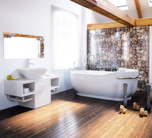 Nowoczesna łazienka - drewniane belki i podłoga, kamienna ściana i świeczki - macie ochotę na domowe spa? fot. fotolia