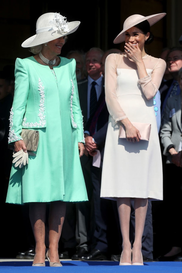 Kamila, księżna Kornwalii oraz Meghan Markle, księżna Sussex podczas celebracji 70. urodzin księcia Karola, 22