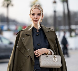 Street Style - Paris Fashion Week - Womenswear Fall/Winter 2025/2026 - Day Two