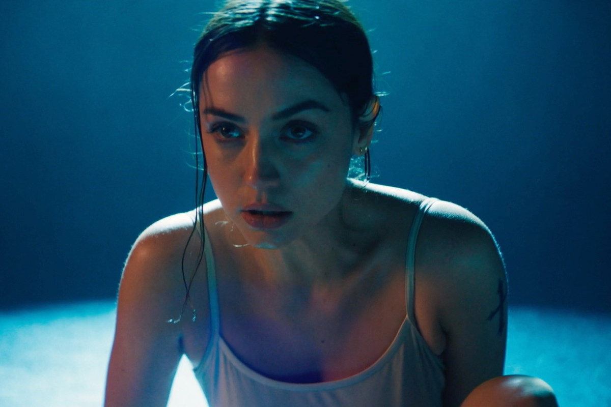 Ana-De-Armas-crouches-in-Ballerina
