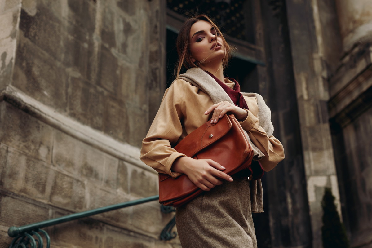 High Fashion Clothing. Woman In Fashionable Clothes In Street