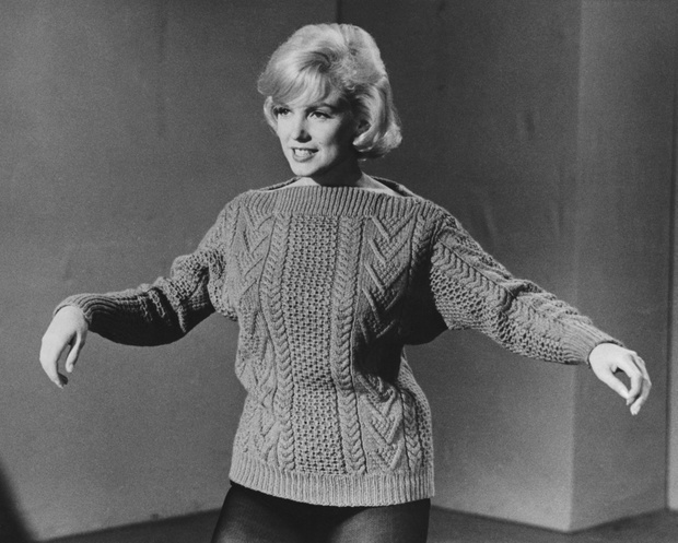 Marilyn Monroe Wearing Sweater and Making a Dance Step