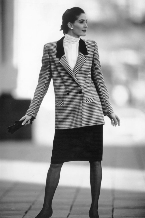 1980s Women,s Fashion: Our model wears Check double breasted jacket with black skirt and high collar blouse