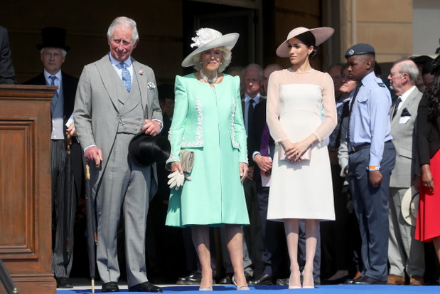 Książę Karol, Kamila, księżna Kornwalii oraz Meghan Markle, księżna Sussex podczas celebracji 70. urodzin księcia Karola, 22