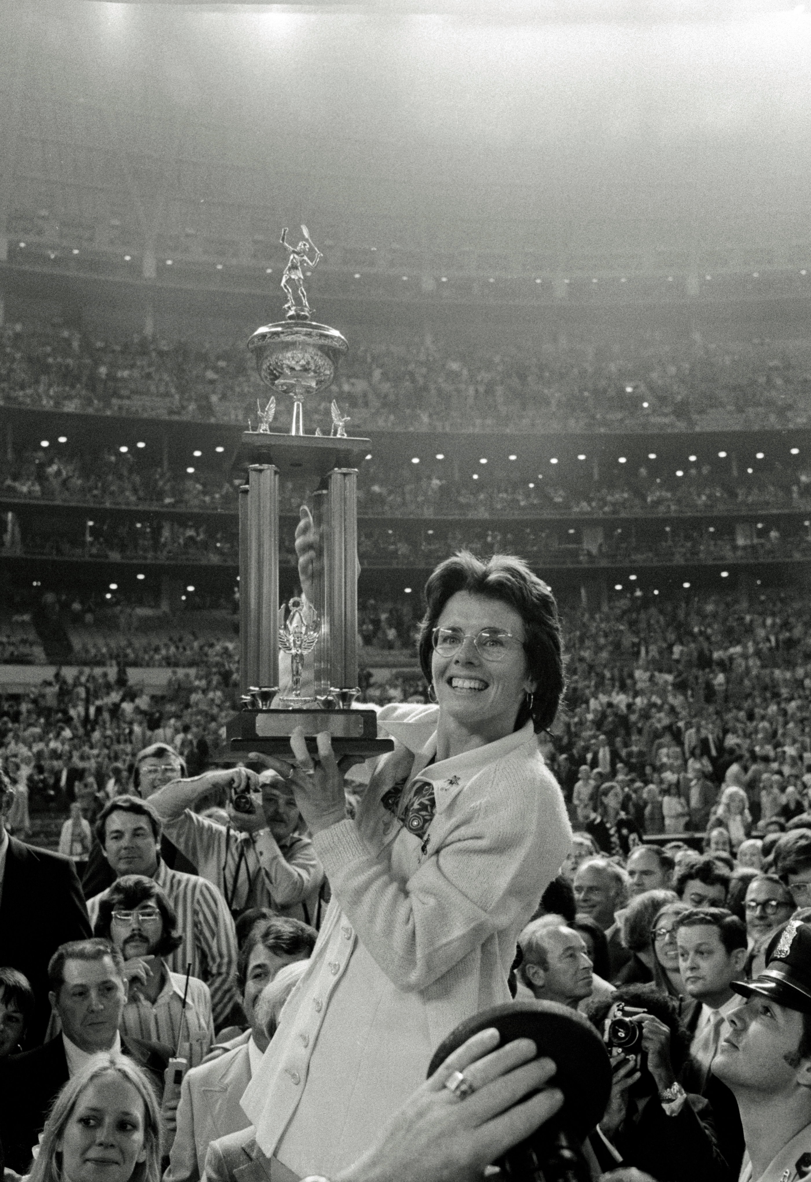 Billie Jean King Holding Trophy
