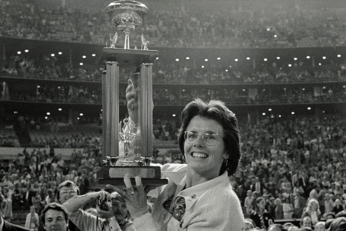 Billie Jean King Holding Trophy