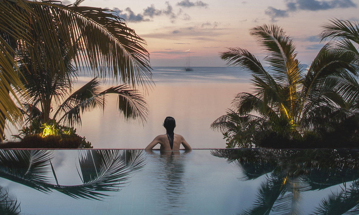 Woman in a pool on the beach