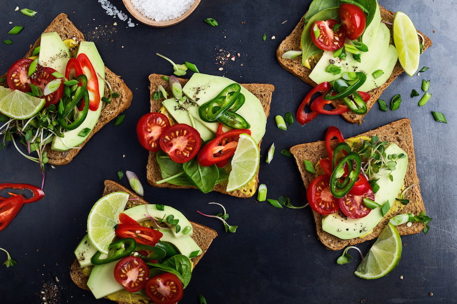 Avocado toasts with fresh vegetables