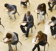 College students taking test in classroom
