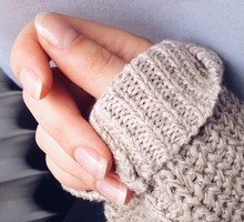 Cropped Image Of Woman Wearing Sweater