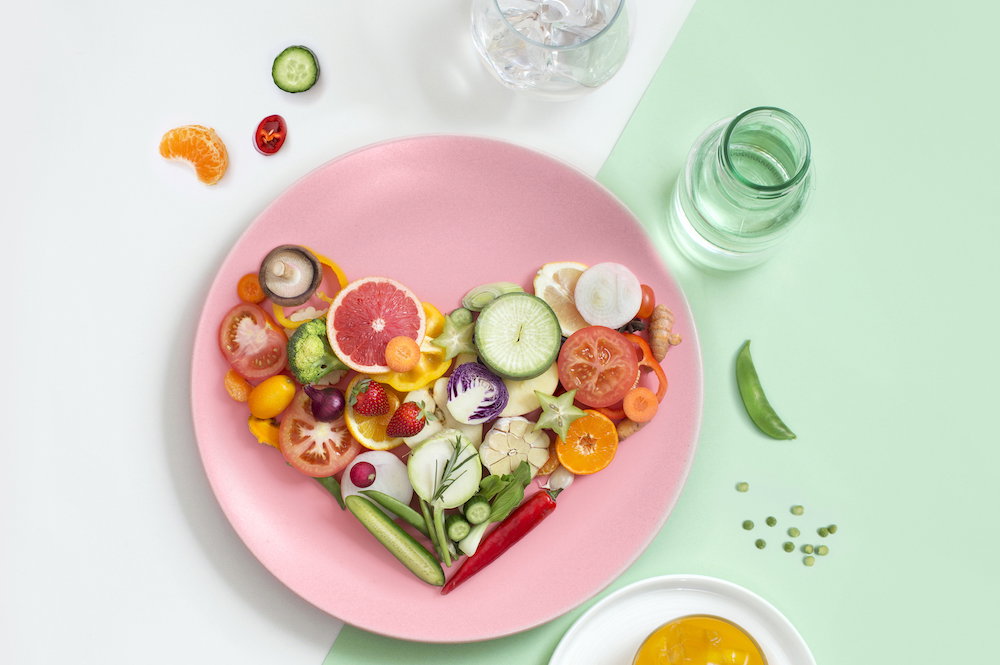 Colourful vegan food eating conceptual still life.
