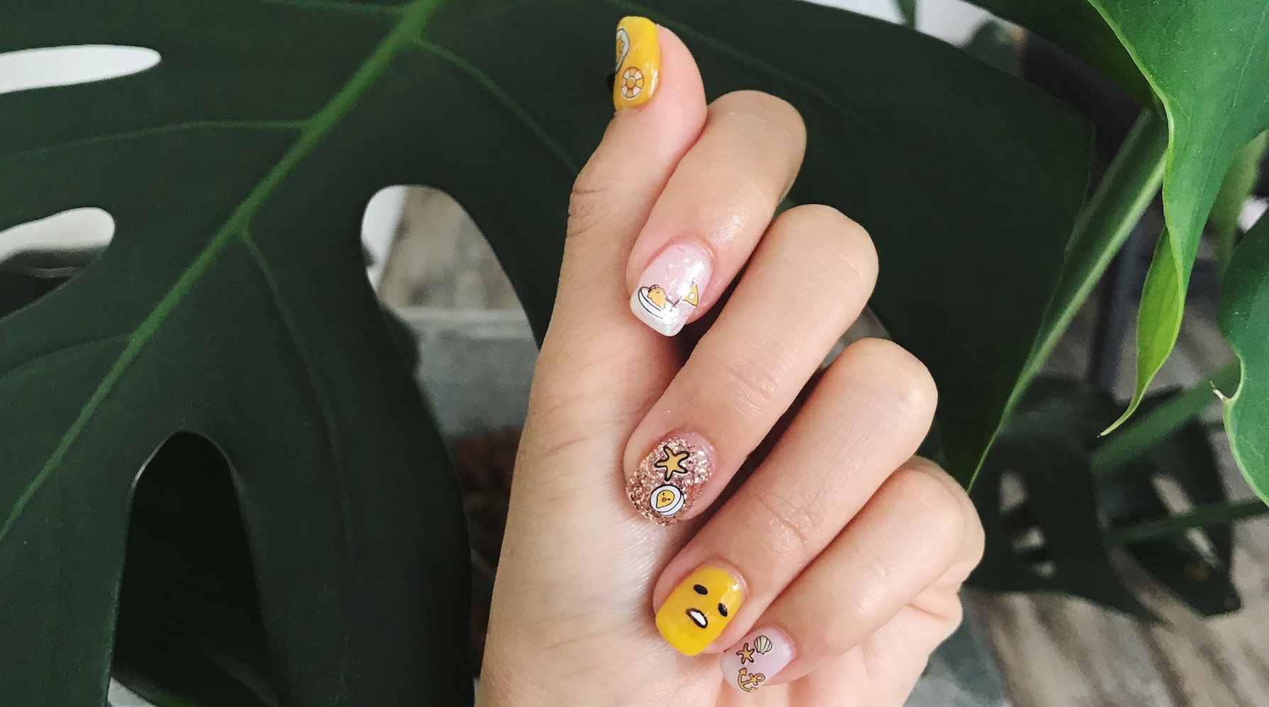 Close-Up Of Woman Hand Showing Nail Art