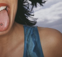Woman with Pierced Tongue