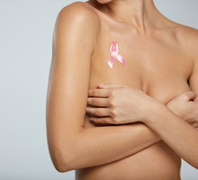 Naked Woman With Breast Cancer Awareness Ribbon On Chest