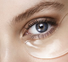 beauty shot of a beautiful woman with collagen eye mask