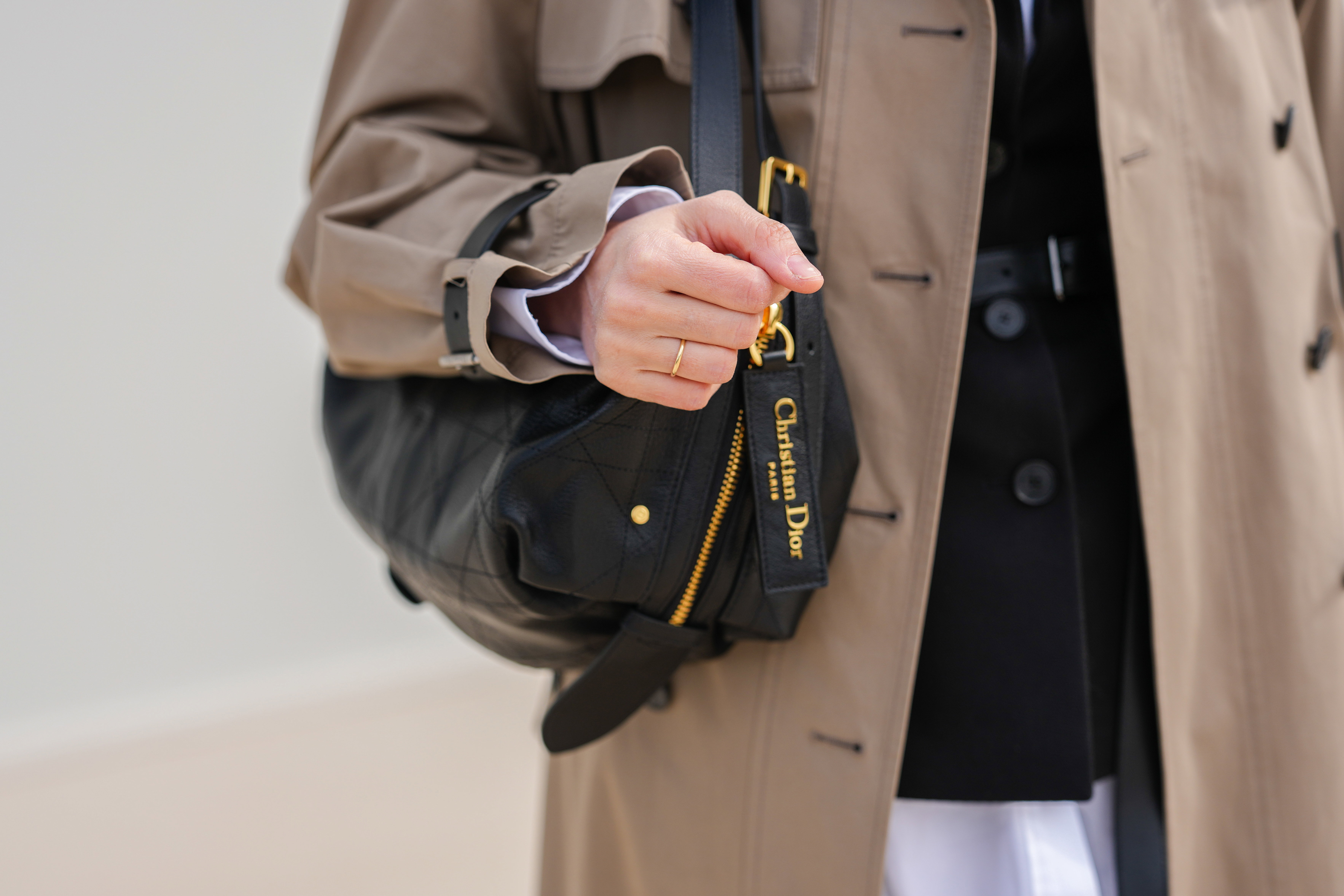 Street Style - Paris Fashion Week - Womenswear Fall/Winter 2025/2026 - Day Two