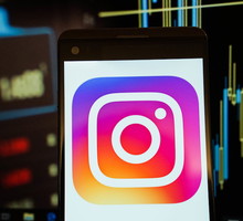 The logo of Instagram is seen in a smartphone