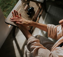 A woman moisturises her hands