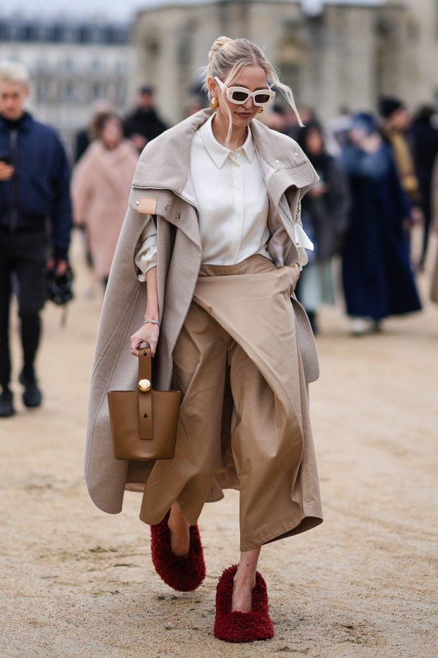 Street Style - Paris Fashion Week - Womenswear Fall/Winter 2024/2025 - Day Five