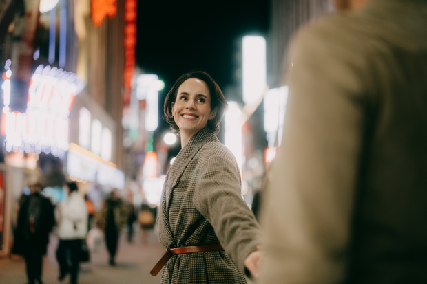Woman enjoying Tokyo with her date at night