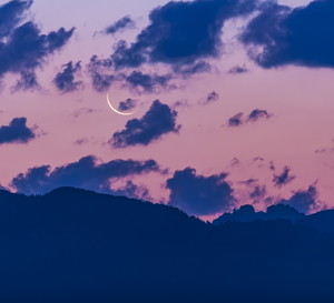 The thin waning crescent Moon at dawn on August 20