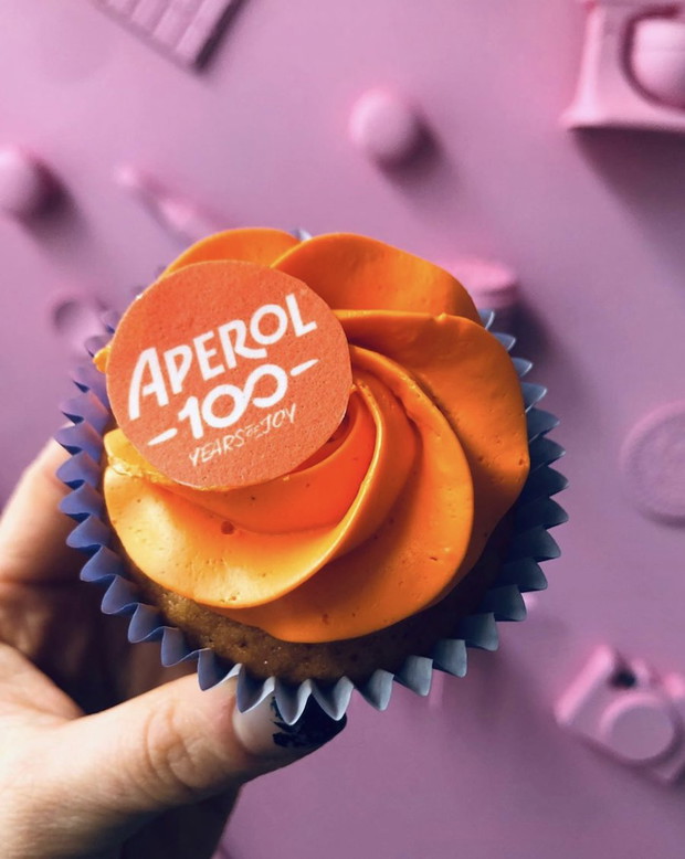 Babeczki Ciastka z kremem o smaku Aperol Spritz.