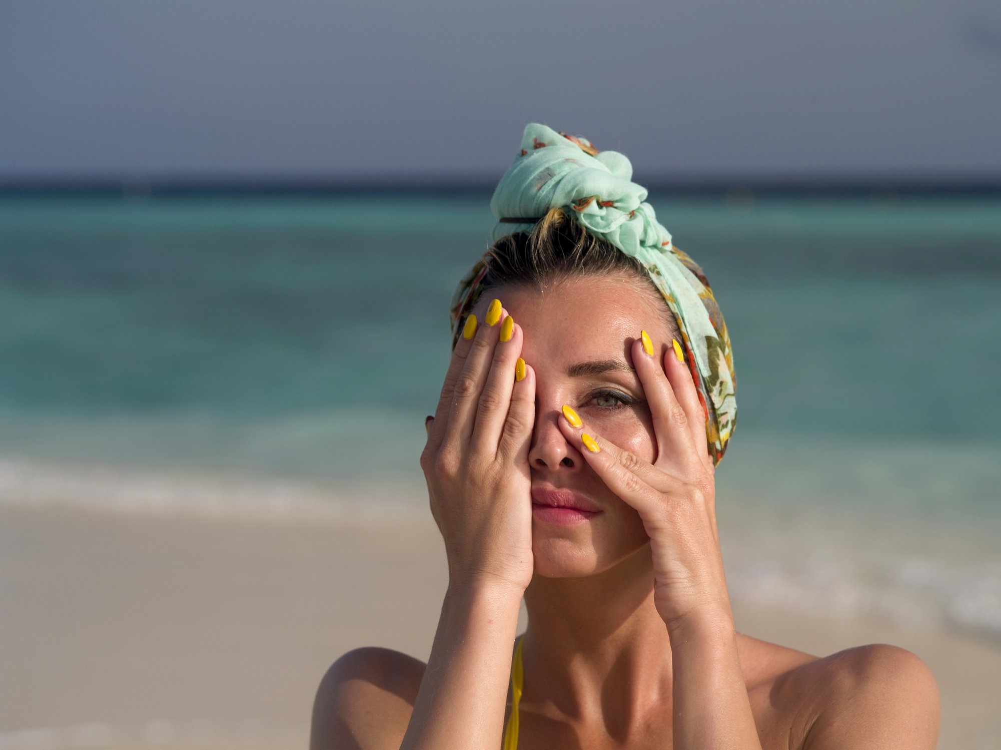 Fashion Model Wearing Swimwear On Beach