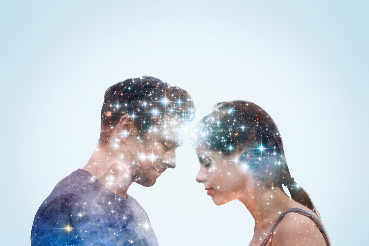 Couple leaning into each other with stars.