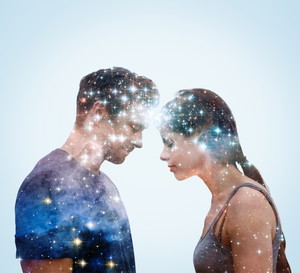Couple leaning into each other with stars.