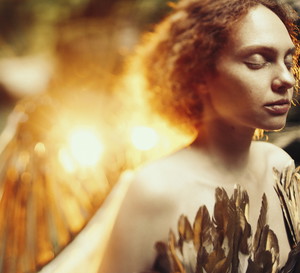 Caucasian woman with angel wings