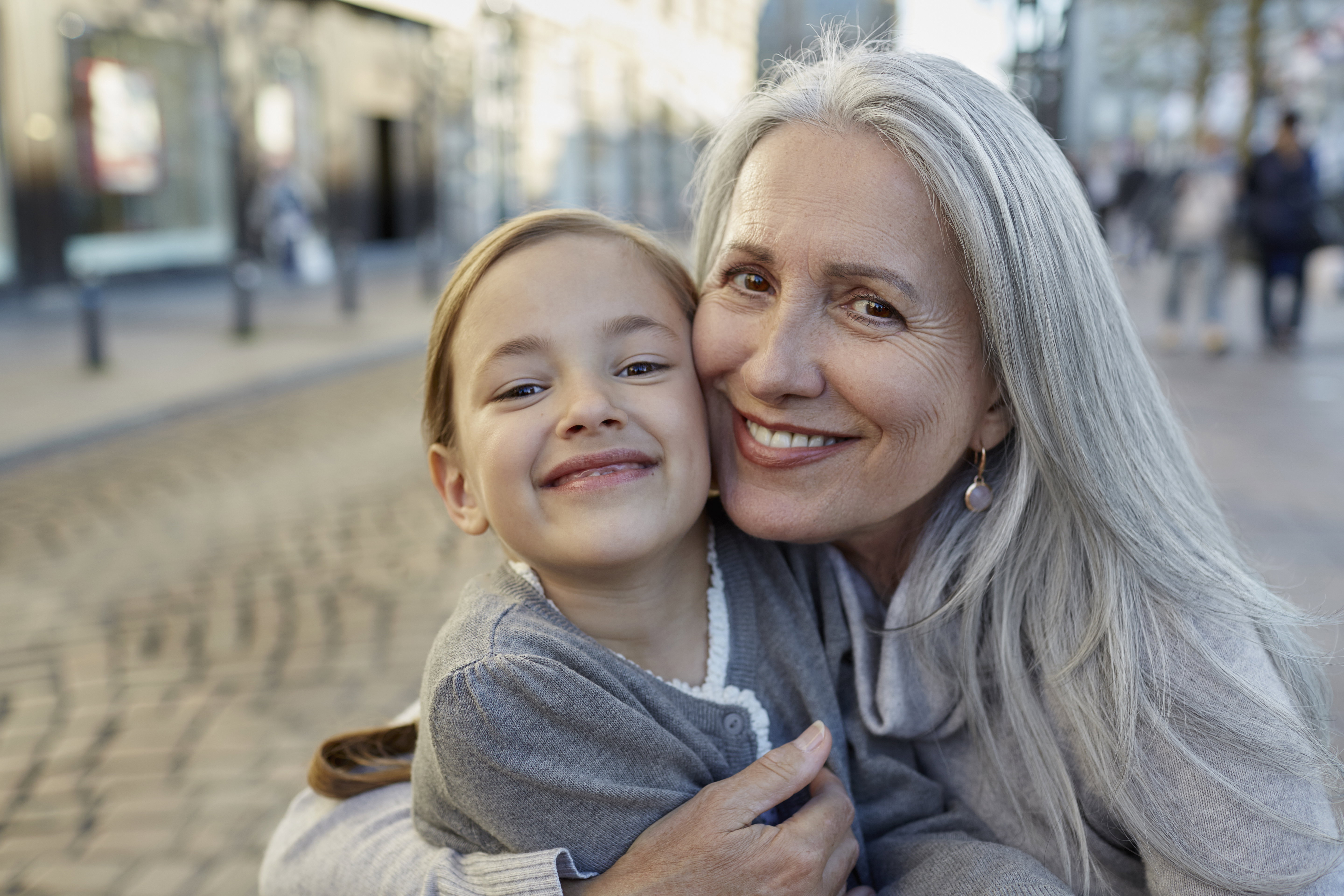Portrait of smiling grandmother with granddaughter