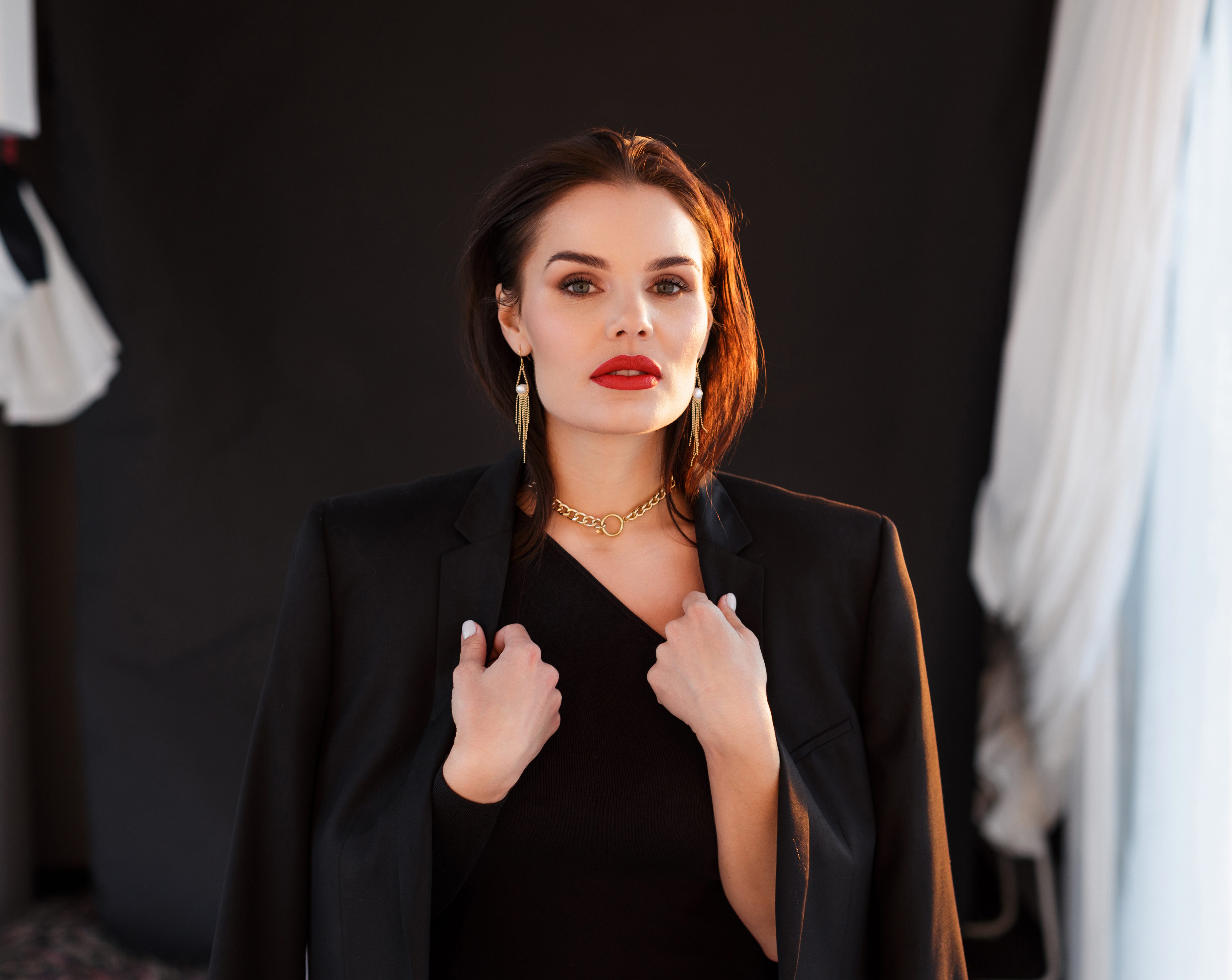 Charming stylish brunette in the sunset lights