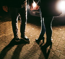 Couple says goodbye to each other in the night