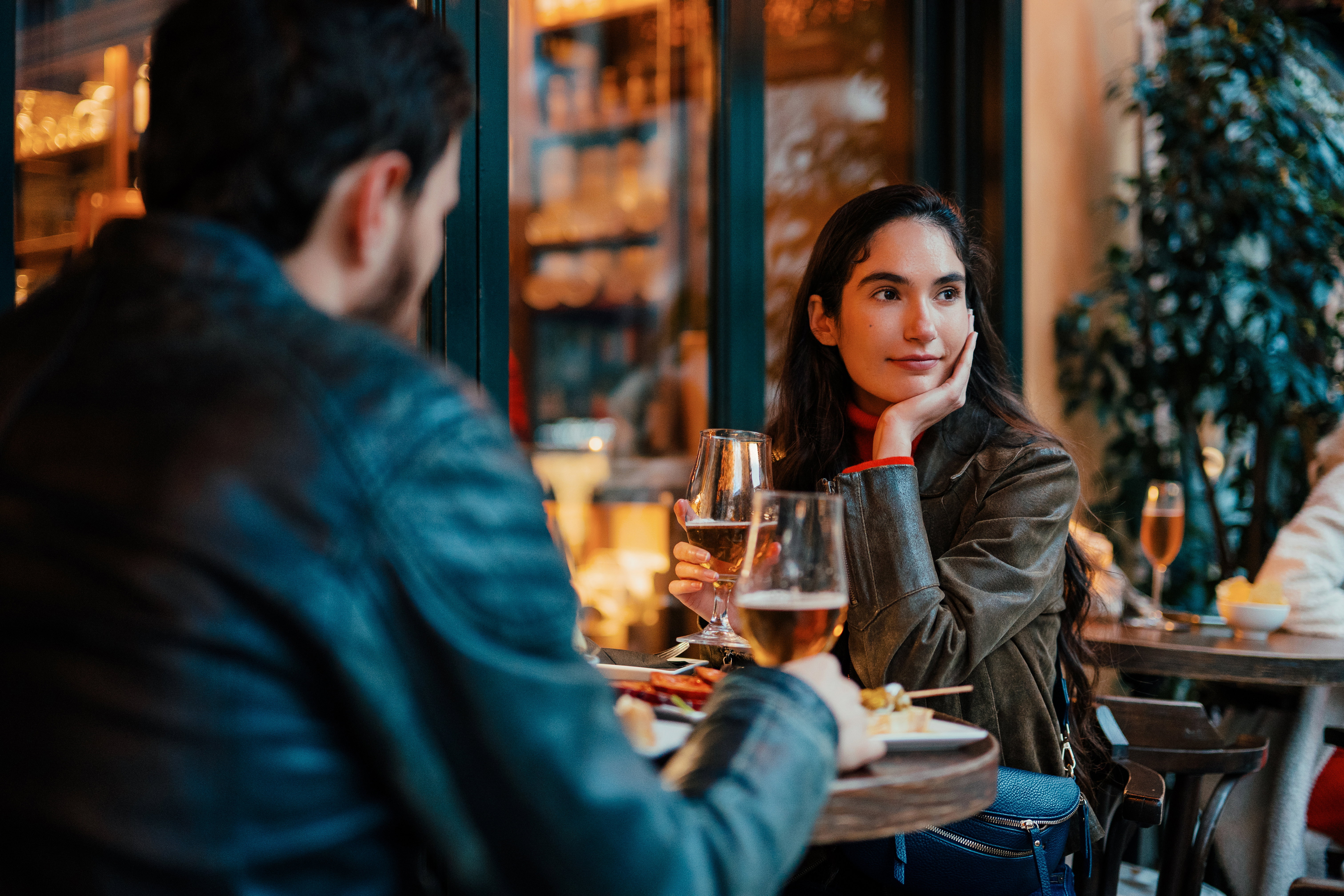 Woman  Dining With Partner at Restaurant