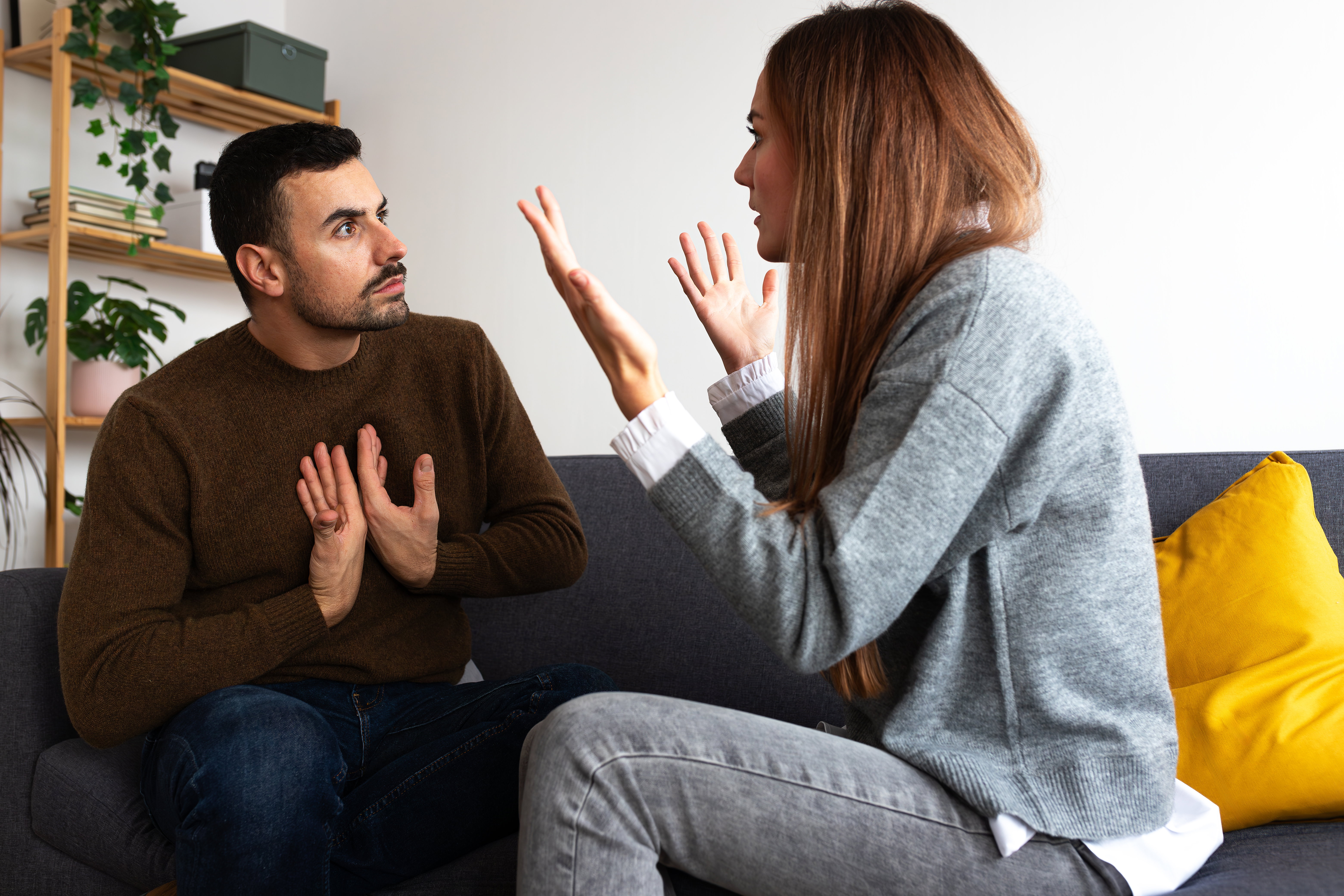 Young couple having an argument. Woman is angry with man.