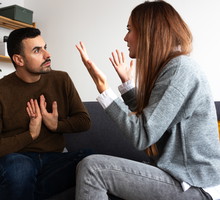 Young couple having an argument. Woman is angry with man.