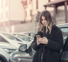 Woman checking cell phone