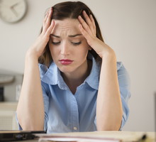 Businesswoman frustrated at work