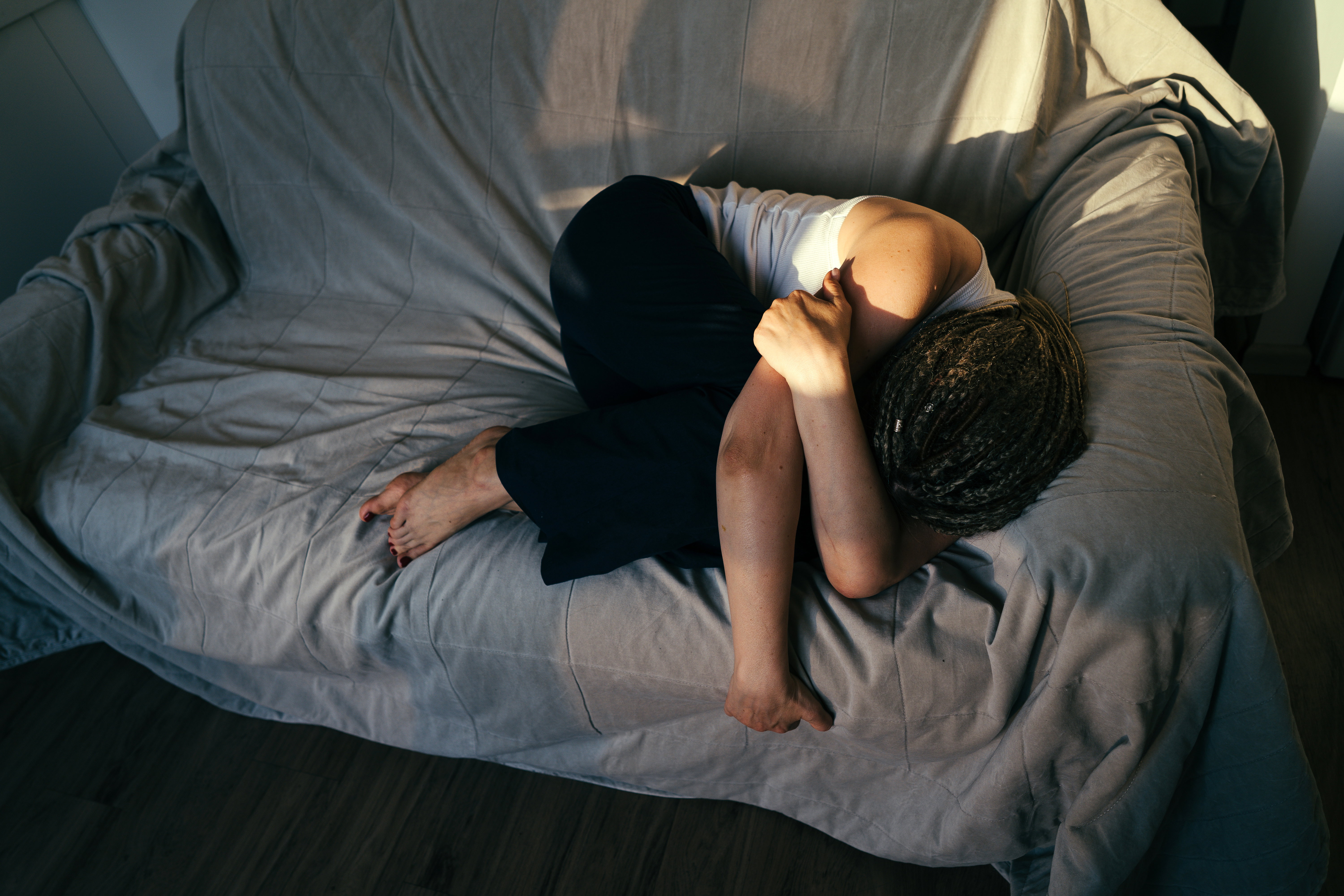 Portrait of a woman lying on the sofa