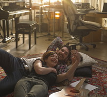 Man and woman talking on the phone